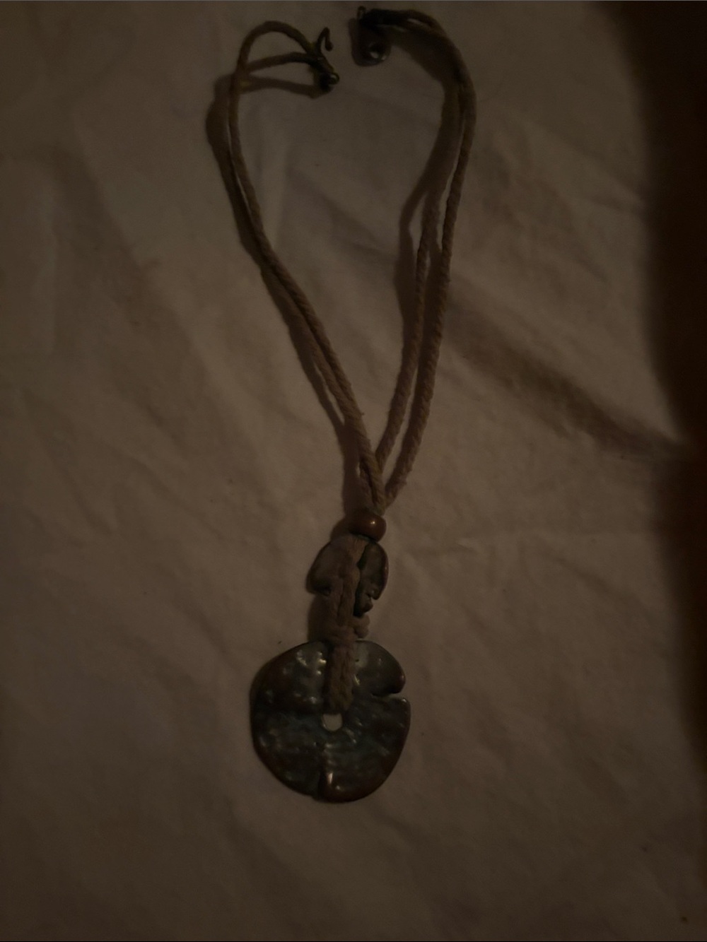 Handcrafted Brown Cord Necklace with Patina Pendant